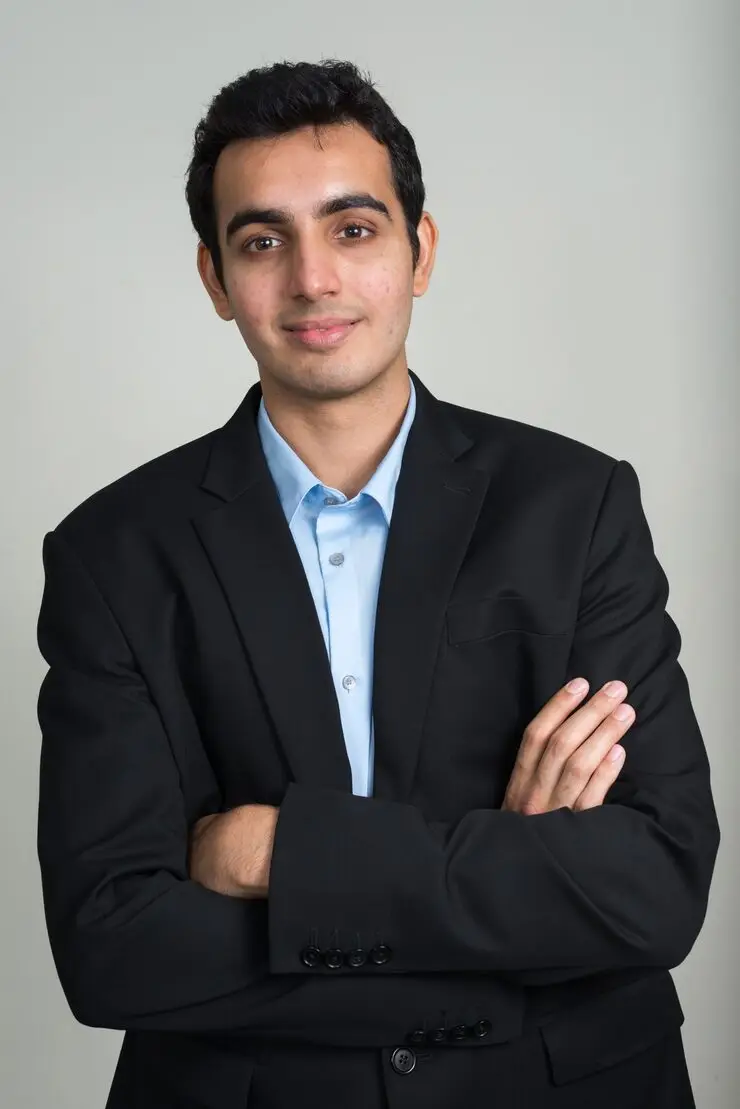 Young Handsome Indian Businessman Suit Against White Wall 251136 69022 - Charge Point Homes